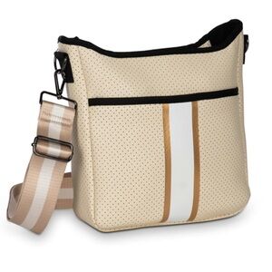 Haute Shore Blake Deluxe Crossbody Bag in the "Dune" style.
